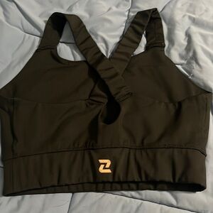 Zelos longline sports bra, black with gold/rose decal. Worn once. Runs small.
